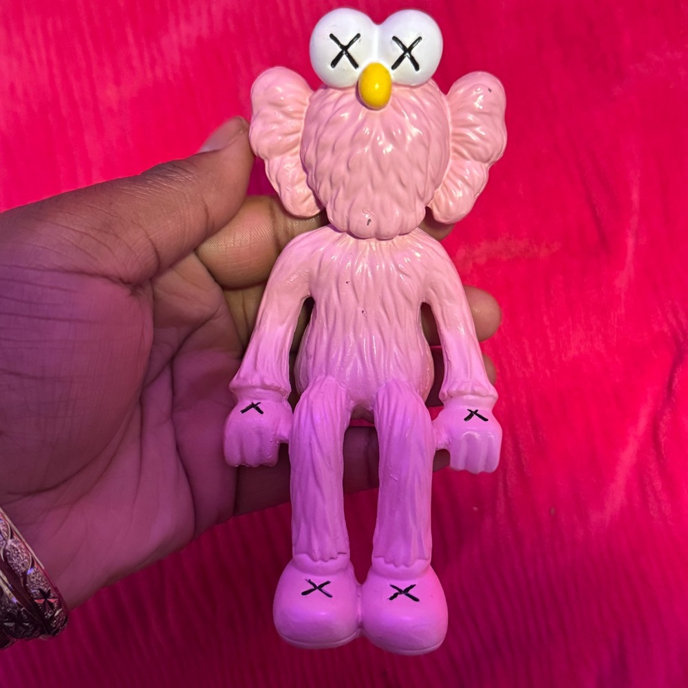 KAWS Pink Action Figure with Yellow Nose